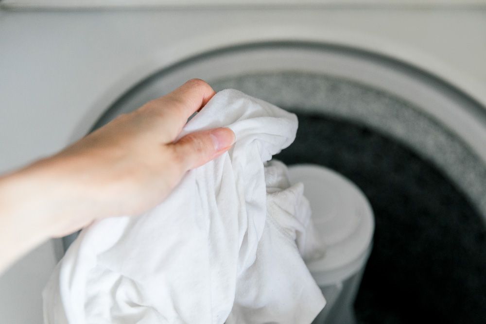 laver le vêtement taché comme d'habitude